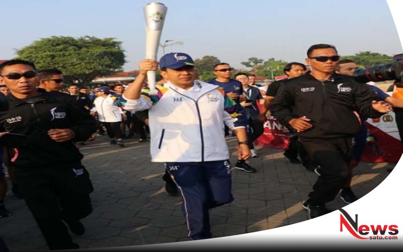 Kapolda DIY Berlari Membawa Api Obor Asian Games 2018