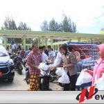 Polres Buru Bagi-bagi Nasi Bungkus Gratis