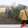 Korem 082 CPYJ Bersih-Bersih Taman Makam Pahlawan