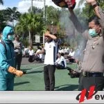 Kapolres Batu Ajak Masyarakat Berjemur Tangkal Penyebaran Virus Corona