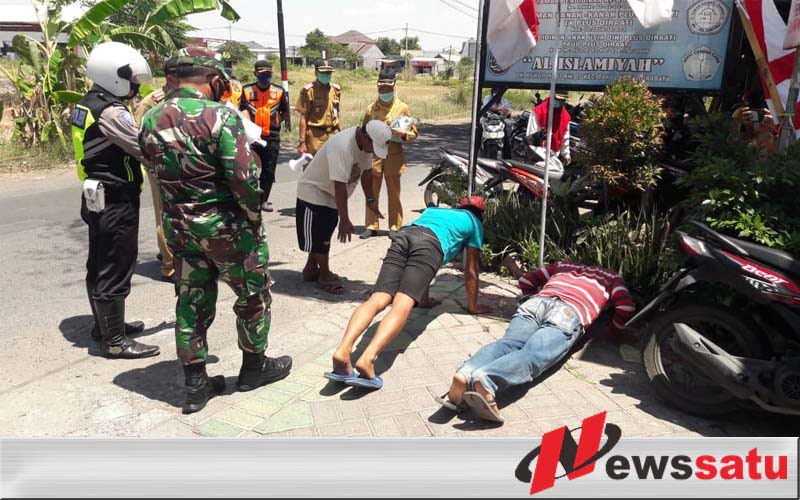Tak Patuhi Patuh Protokol Kesehatan Di Surabaya, Di Hukum Push Up Dan KTP Disita