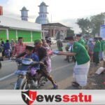 PAC GP Ansor dan Fatayat NU Pujer Berbagi Ratusan Takjil dan Masker