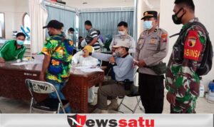 Proses Karantina PMI Dikawal TNI-Polri di Pamekasan