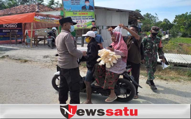 Tim Satgas Covid-19 dan PPKM Mikro Tindak Pelanggar Prokes Di Ambat Pamekasan