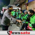 Kapolres Pamekasan Bagikan Bansos dan Masker Gratis ke Pengemudi Ojol