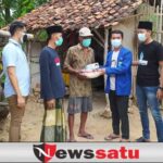 Polres Gandeng PMII Pamekasan Bagikan Bansos dan Masker Kepada Warga Kurang Mampu