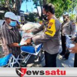 Tim Dapur Umum PPKM Darurat Polres Pamekasan Bagikan Ratusan Nasi Kotak Untuk Warga Duafa