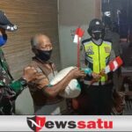 Polres Semangati Warga Lawan Covid-19 Dengan Bagi Masker dan Bendera di Pamekasan