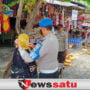 Pamekasan Level 1, Polisi Tetap Tebar Masker Gratis dan Disiplin Protokol Kesehatan