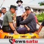Bupati Banyuasin Bersama Koramil 430-04 Talang Kelapa Evakuasi Korban Banjir