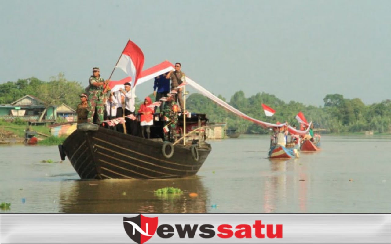 Kecamatan Bayung Lencir Bentangkan Bendera Merah Putih Sepanjang 177 Meter 