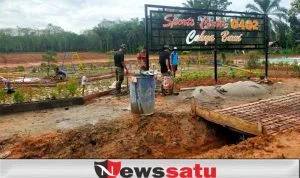 Kembangkan Potensi Olahraga, Satgas TMMD Bangun Sarana Lapangan Volly 