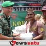 Kodim 0402 OKI Bagikan Ratusan Nasi Kotak Kepada Tukang Becak
