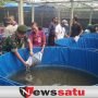 Kodim 1610 Klungkung Bersama Warga Desa Takmung Tebar Ribuan Bibit Lele
