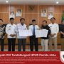 Bupati OKI Tandatangani NPHD Pemilu 2024
